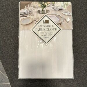 New in package white oblong table cloth